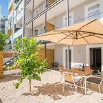Wood Wall & Garden Apartment